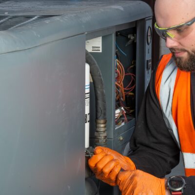Avelair engineer servicing a compressor